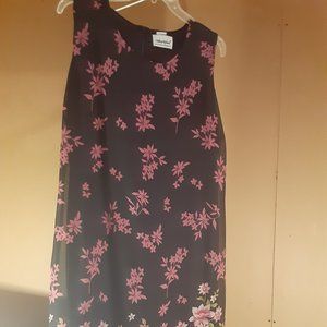Women's sleeveless spring floral style dress.